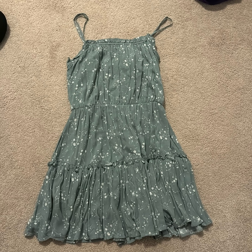 Green spaghetti strap dress with white flowers
